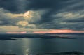 Rain cloud are over the mountain and lake on the twilight Royalty Free Stock Photo