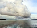 Rain cloud over ocean bay