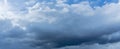 Rain cloud and sun beam. Panorama of cloudy gray sky. Abstract textured. Rain clouds background. Space for text. Royalty Free Stock Photo