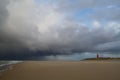 Rain clouds approaching lighthouse Royalty Free Stock Photo
