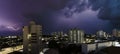 Rain clouds loaded with lightning and lightning arrive in the city of MariÂ­lia Royalty Free Stock Photo