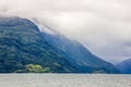 Clouds over the fjord Royalty Free Stock Photo