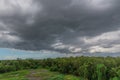 Rain clouds over the forest before a storm in rainy season. Royalty Free Stock Photo