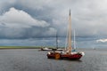 Storm clouds and sailboats Royalty Free Stock Photo