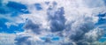 Banner Panorama Storm Clouds Gather against blue sky