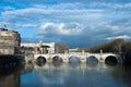 Rain clouds under the Tiber river and Bridge Ponte Sant` Angelo near of Castel Sant Angelo, Roma, Italy, February 2018. Water Royalty Free Stock Photo