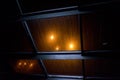 Rain dripping on glass roof with streetlights. Art Night photo