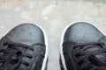 Rain drop on black sneakers Royalty Free Stock Photo