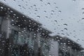 Rain drop on glass view from car on house background Royalty Free Stock Photo