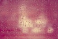 Rain drop on window glass with blur tree background, vintage col Royalty Free Stock Photo