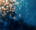 Rain drop on window, traffic light at night make bokeh Royalty Free Stock Photo