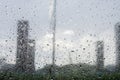 Rain droped on the window. blurred building.