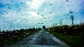 Rain droplets on car windshield Royalty Free Stock Photo