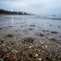 Rainy moment by the seashore with gentle waves approaching the shore Royalty Free Stock Photo