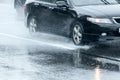 Rain dropping on wet asphalt road. car traffic in high speed Royalty Free Stock Photo