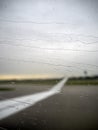 Rain drops on airplane window Royalty Free Stock Photo