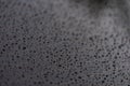 Rain drops on back car glass with prottective coating Royalty Free Stock Photo