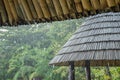 Rain drops from the bamboo roof. Royalty Free Stock Photo