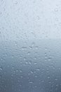 Rain drops on car with glass coating protection Royalty Free Stock Photo