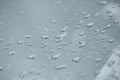 Rain drops on car with glass coating protection Royalty Free Stock Photo