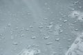 Rain drops on car with glass coating protection Royalty Free Stock Photo