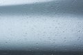 Rain drops on car with glass coating protection Royalty Free Stock Photo