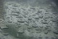 Rain drops on car with glass coating skin Royalty Free Stock Photo