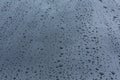 Rain drops on car with glass coating skin Royalty Free Stock Photo