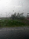 Rain drops in a car window glass