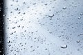 rain drops on clear glass wind screen of car , rain droplets Royalty Free Stock Photo