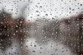 Rain drops on clear window. Grey sad rainy day outside. Royalty Free Stock Photo