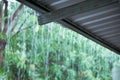 Rain drops fast dipping from zinc roof Royalty Free Stock Photo