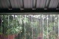 Rain drops fast dipping from zinc roof Royalty Free Stock Photo