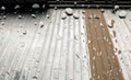 Rain drops in front of the glass on the silver roof backdrop Royalty Free Stock Photo