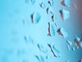 Rain drops on a glass close up