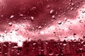 Rain drops on glass for red backgrounds rainy fall autumn weather Royalty Free Stock Photo