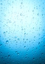 Rain drops on glass water background or black and white texture. Royalty Free Stock Photo