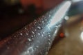 Rain drops on metal pipe Royalty Free Stock Photo