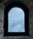 Rain drops in the rock window