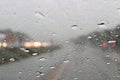 Rain drops shot through a car windshield Royalty Free Stock Photo