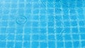 Rain drops on the swimming pool. Royalty Free Stock Photo