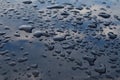 Rain drops on top of the dark car roof Royalty Free Stock Photo