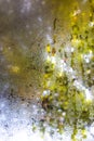 Rain drops, Water drops on mirror window in bokeh green garden background, Selective focus, About Morning, Rainy day concept Royalty Free Stock Photo