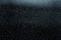 rain drops on a window with a black background and a dark sky in the background. generative ai Royalty Free Stock Photo