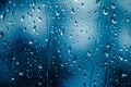 Rain Drops on a Window With Blue Sky in the Background Royalty Free Stock Photo