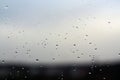 Rain drops on window with blured background Royalty Free Stock Photo