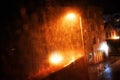 Rain drops on the window with dark streets outside Royalty Free Stock Photo