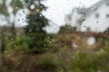 Rain drops on window glass with view to the countryside Royalty Free Stock Photo