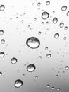 Rain drops on a window pane, close up, black and white Royalty Free Stock Photo