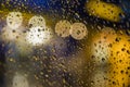 Rain drops on window. Peaceful evening or night at home when raining outside. Royalty Free Stock Photo